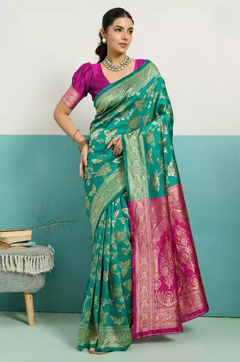 rama green banarasi silk blend zari woven with jaal saree with blouse