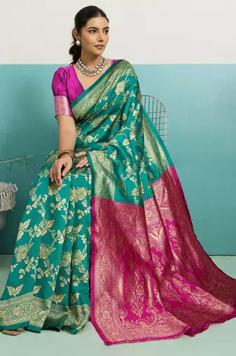 rama green banarasi silk blend zari woven with jaal saree with blouse