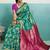 rama green banarasi silk blend zari woven with jaal saree with blouse