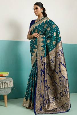 dark green banarasi silk blend zari woven with jaal saree with blouse 1
