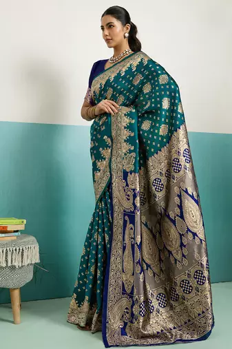 dark green banarasi silk blend zari woven with jaal saree with blouse