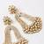 Radiant crystal arch statement earrings