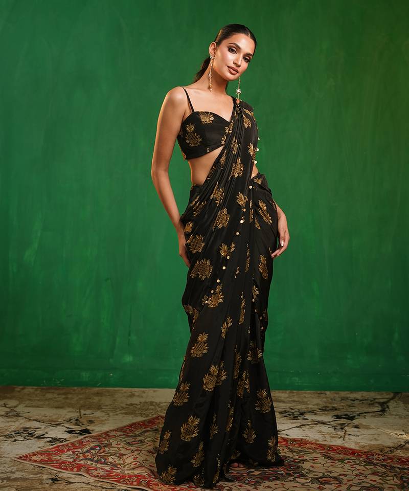 Black printed heavy crepe drape saree and organza poncho set