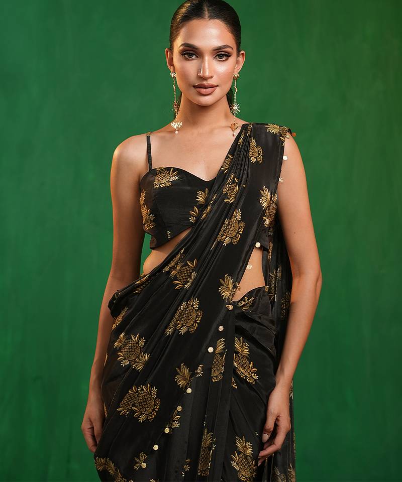 Black printed heavy crepe drape saree and organza poncho set