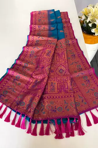 blue color zari weaves and meenakari work in border having contrast pallu silk blend saree