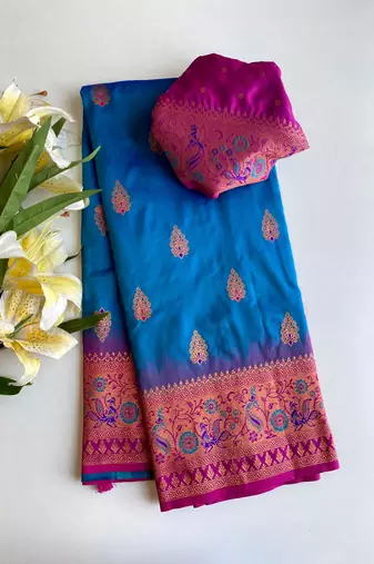 blue color zari weaves and meenakari work in border having contrast pallu silk blend saree