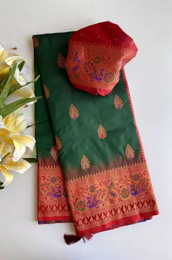 dark green color zari weaves and meenakari work in border having contrast pallu silk blend saree