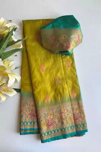 olive green color zari weaves and meenakari work in border having contrast pallu silk blend saree