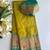 olive green color zari weaves and meenakari work in border having contrast pallu silk blend saree