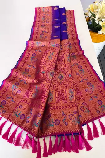 purple color zari weaves and meenakari work in border having contrast pallu silk blend saree