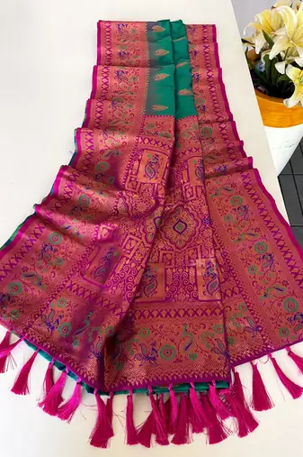 green color zari weaves and meenakari work in border having contrast pallu silk blend saree