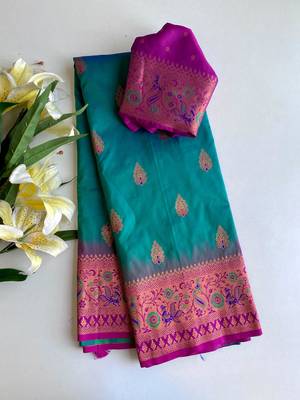 green color zari weaves and meenakari work in border having contrast pallu silk blend saree 4