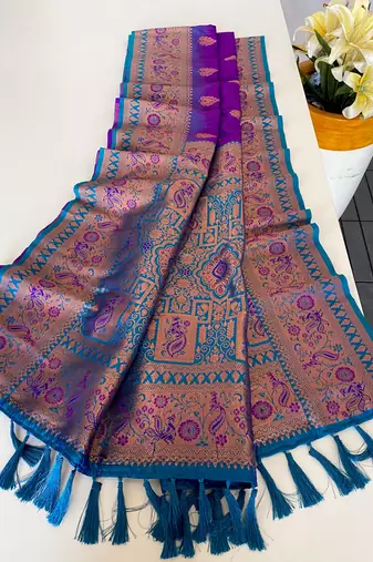 violet color zari weaves and meenakari work in border having contrast pallu silk blend saree