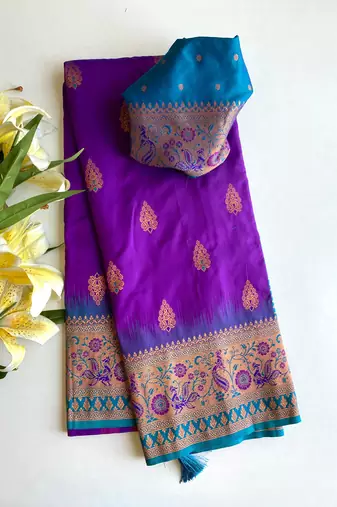 violet color zari weaves and meenakari work in border having contrast pallu silk blend saree