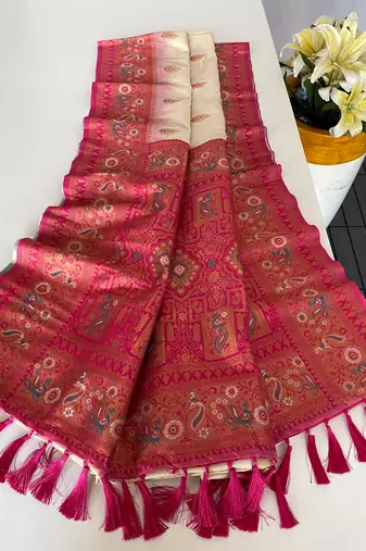white color zari weaves and meenakari work in border having contrast pallu silk blend saree