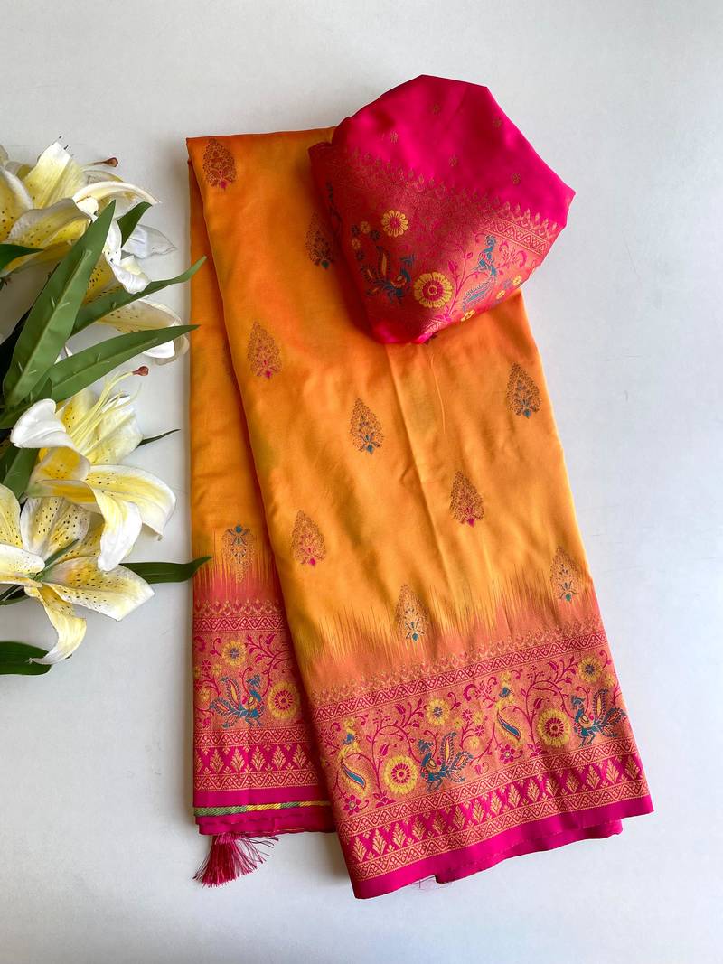 orange color zari weaves and meenakari work in border having contrast pallu silk blend saree