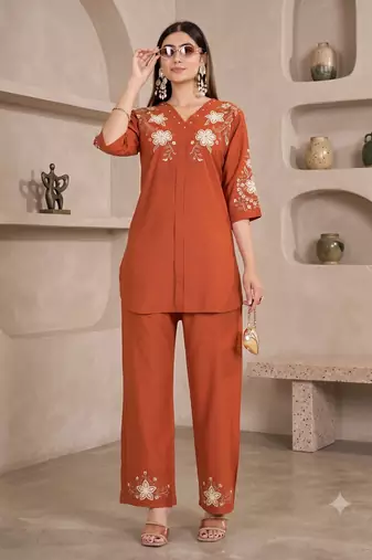Women's orange embroidered kurti with pant set