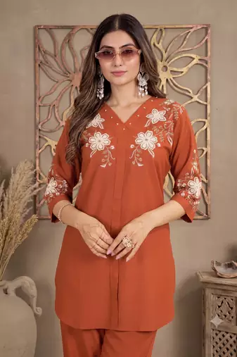 Women's orange embroidered kurti with pant set