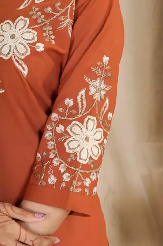 Women's orange embroidered kurti with pant set