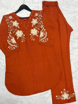 Women's orange embroidered kurti with pant set 4