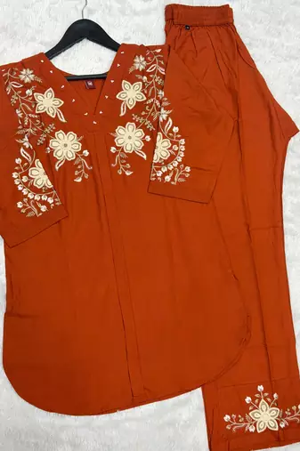 Women's orange embroidered kurti with pant set