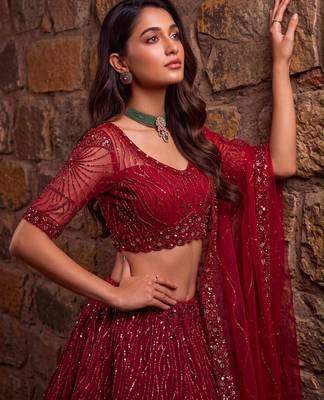 red net embroidered party lehenga choli 4