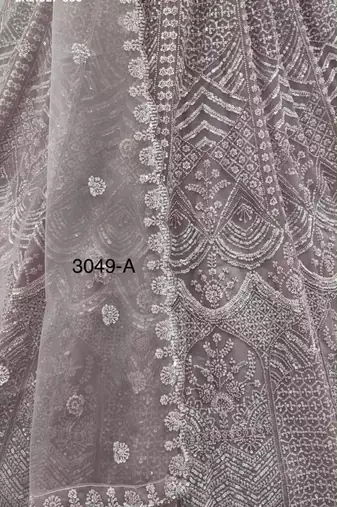 mauve net embroidered party lehenga choli