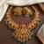 south indian temple jewelry set - goddess lakshmi necklace with jhumka earrings, green beads & pearls