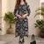 Women Printed Regular Kurta with Trousers