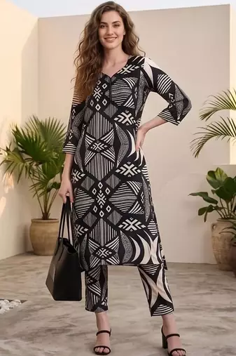 Women Printed Regular Kurta with Trousers