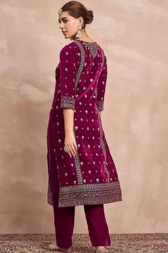 Women Ethnic Motifs Embroidered Regular Thread Work Velvet Kurta with Trousers