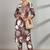 Women Floral Printed Regular Thread Work Kurta with Trousers