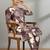 Women Floral Printed Regular Thread Work Kurta with Trousers