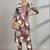 Women Floral Printed Regular Thread Work Kurta with Trousers