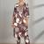 Women Floral Printed Regular Thread Work Kurta with Trousers