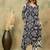 Women Geometric Printed V-Neck Kurta with Trousers