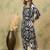 Women Geometric Printed V-Neck Kurta with Trousers