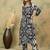 Women Geometric Printed V-Neck Kurta with Trousers