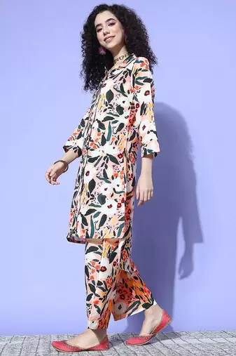 Women Printed Regular Kurta with Trousers