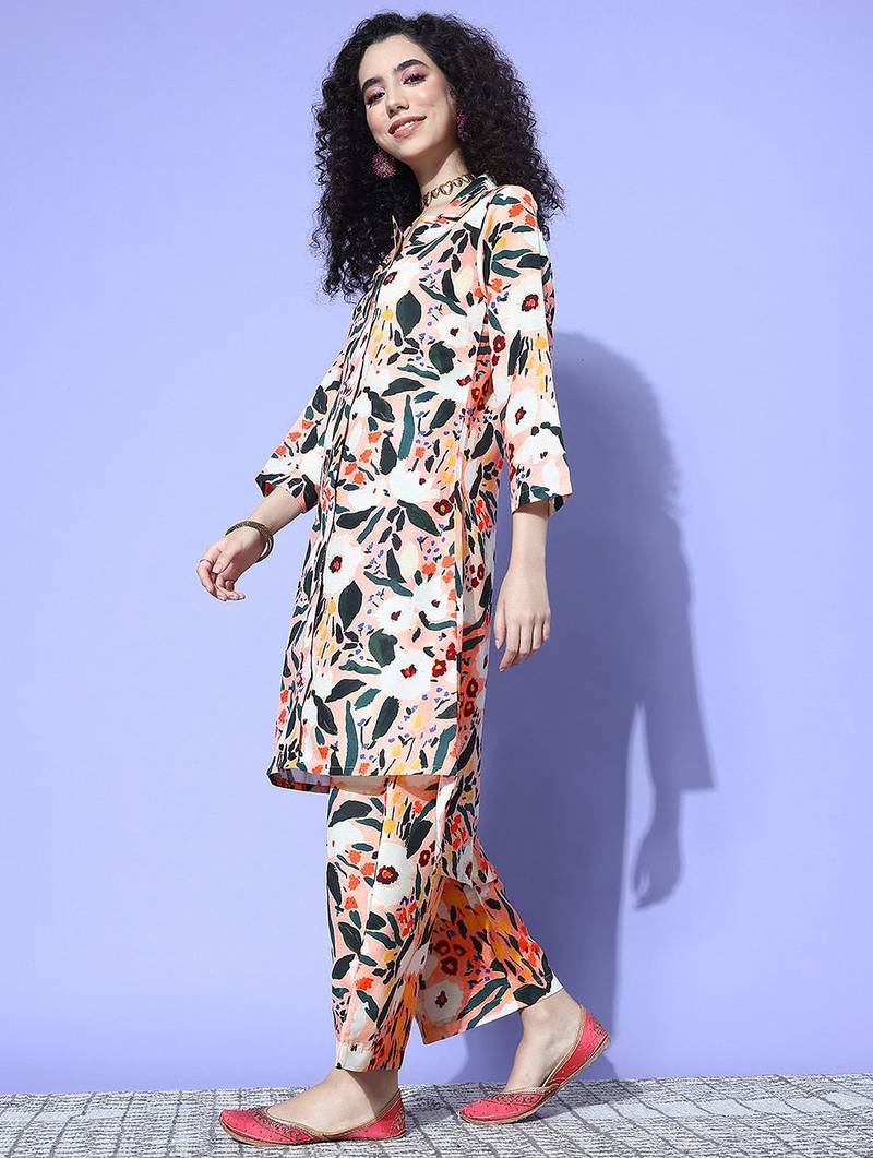 Women Printed Regular Kurta with Trousers