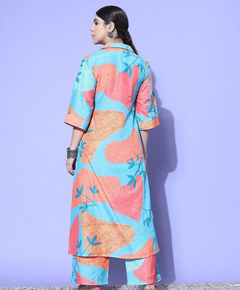 Women Printed Regular Kurta with Trousers
