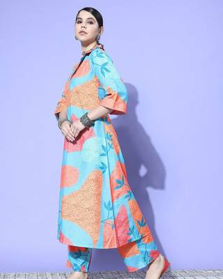 Women Printed Regular Kurta with Trousers 5