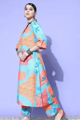 Women Printed Regular Kurta with Trousers