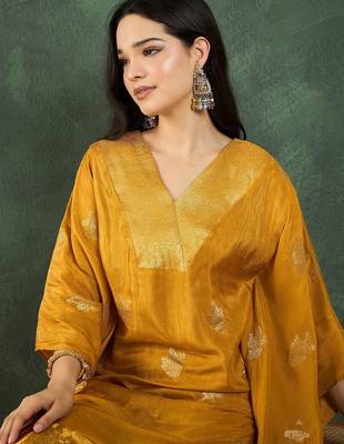 Women Ethnic Motifs Printed Regular Thread Work Kurta with Trousers 5