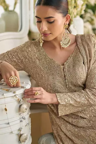 Beige & pink faux georgette embroidered readymade palazzo suit