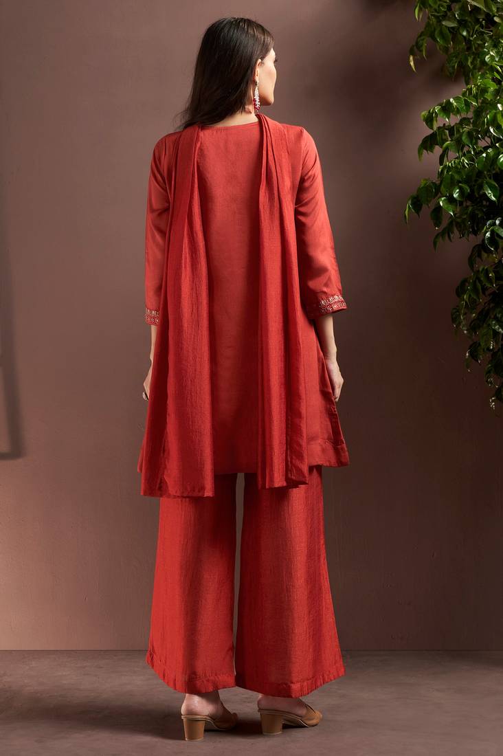 Rust silk blend embroidered mirror work ethnic kurta set with matching dupatta