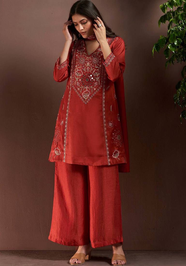 Rust silk blend embroidered mirror work ethnic kurta set with matching dupatta