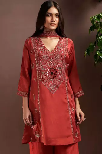 Rust silk blend embroidered mirror work ethnic kurta set with matching dupatta