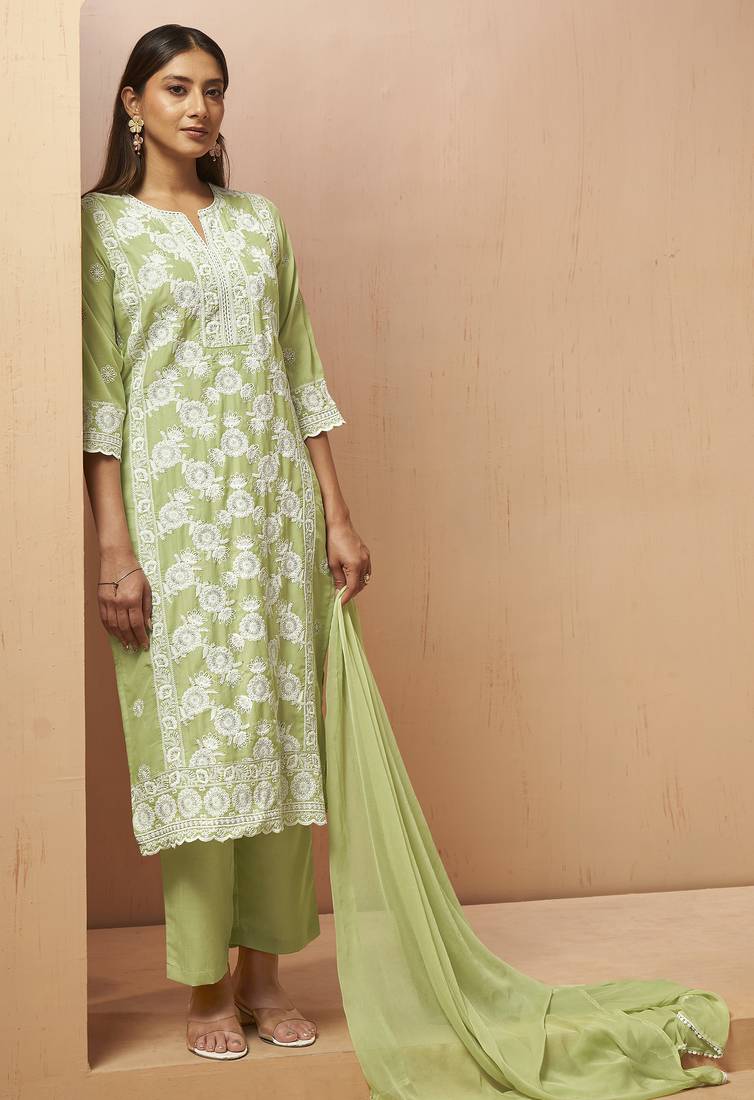 Green cotton blend embroidered thread work ethnic kurta set with matching dupatta