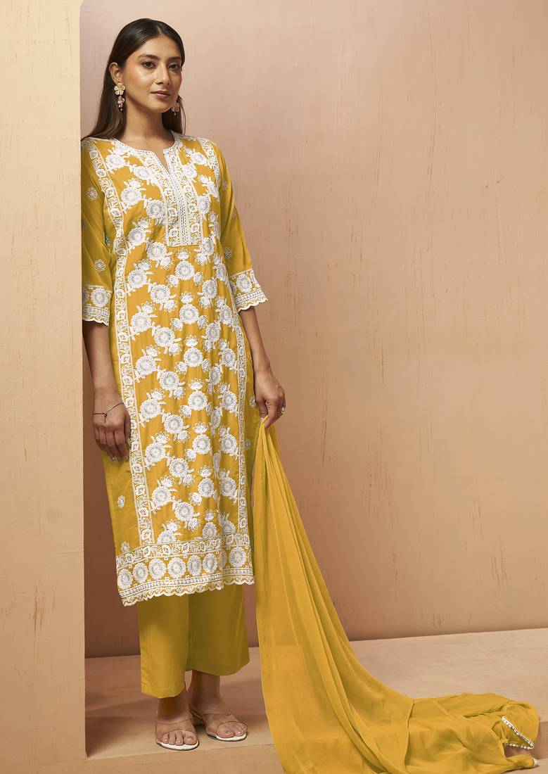 Green cotton blend embroidered thread work ethnic kurta set with matching dupatta